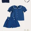 Lookbooks | Pepa London Broderie Anglaise Statement Collar Short Sleeve Blouse in Blue (4-12yrs) | Broderie Anglais Button Detail Shorts in Blue (4-12yrs) | Plain Cardigan in Navy (6mths-10yrs) | Openwork short socks White (0mths-8yrs) | Navy Linen Big Bow Hairband
