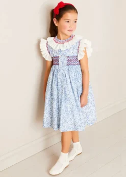 Lookbooks | Pepa London Charlotte Floral Hand Smocked Sleeveless Dress in Blue (12mths-10yrs) | Openwork Cotton Cardigan in Cream (6mths-10yrs) | Girls Ivory Leather Mary Jane Shoes (20-34EU) | Plain Linen Hairband in Red | Openwork short socks White (0mths-8yrs)