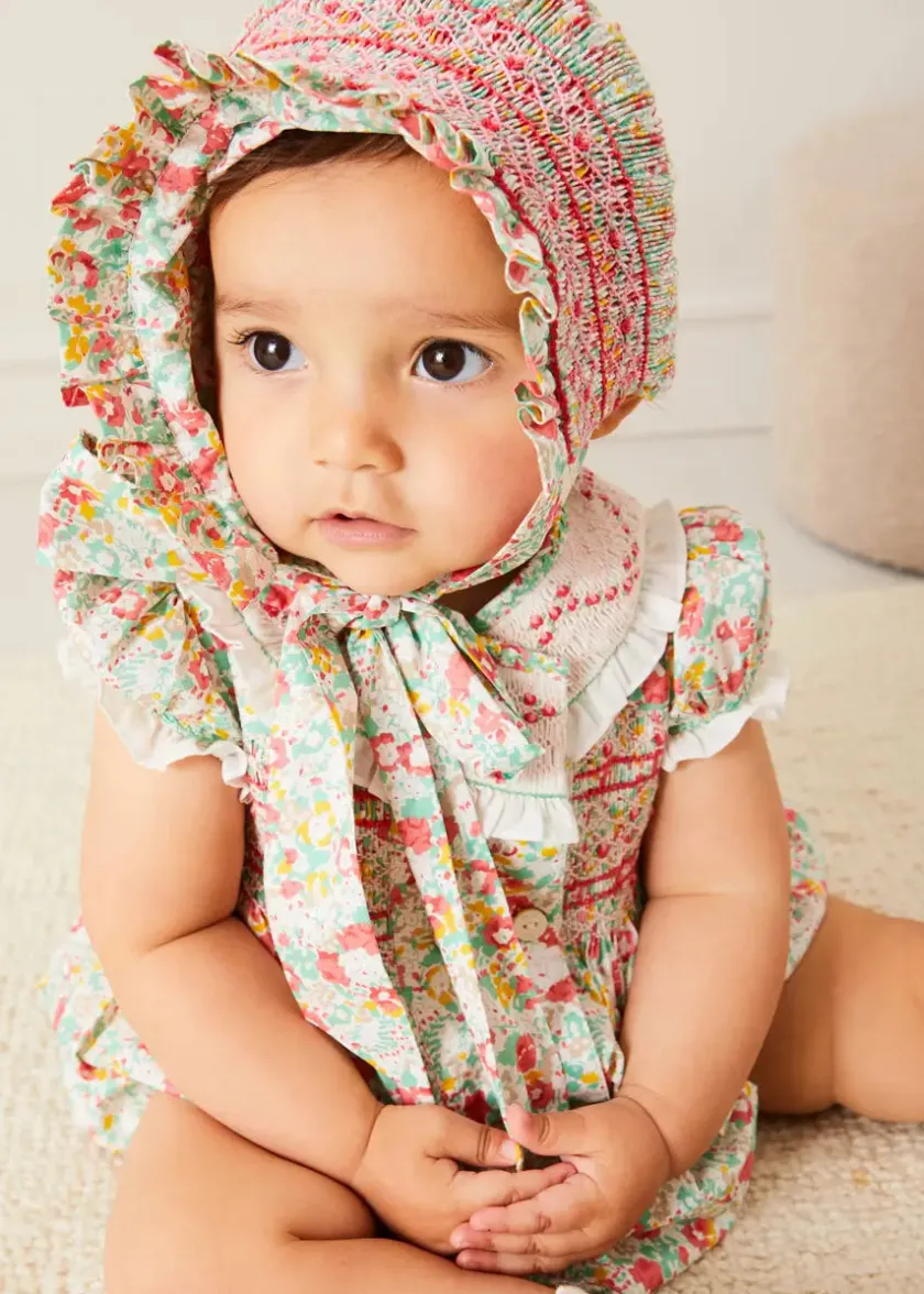 Rompers | Rompers | Pepa London Clementine Floral Hand Smocked Double Breasted Short Sleeve Romper in Coral (6mths-3yrs)