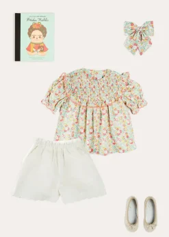Lookbooks | Pepa London Clementine Floral Smock Detail Short Sleeve Blouse in Coral (2-12yrs) | Scallop Trim Embroidered Shorts in White (2-10yrs) | Clementine Floral Quilted Reversible Jacket in Coral (4-12yrs) | Floral Openwork Cotton Cardigan in Pink (2-10yrs) | Linen Ballerina Shoes in Ivory (24-36EU) | Clementine Floral Long Bow Hair Clip in Coral | Little People, Big Dreams - Frida Kahlo Book in Green