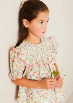 Lookbooks | Pepa London Clementine Floral Smock Detail Short Sleeve Blouse in Coral (2-12yrs) | Scallop Trim Embroidered Shorts in White (2-10yrs) | Clementine Floral Quilted Reversible Jacket in Coral (4-12yrs) | Floral Openwork Cotton Cardigan in Pink (2-10yrs) | Linen Ballerina Shoes in Ivory (24-36EU) | Clementine Floral Long Bow Hair Clip in Coral | Little People, Big Dreams - Frida Kahlo Book in Green