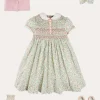 Lookbooks | Pepa London Cordelia Floral Hand-Smocked Short Sleeve Dress in Pink Made with Liberty Fabric (12m-6yrs) | Openwork Cotton Cardigan in Pink (6mths-10yrs) | Leather Mary Jane Shoes in Pink (24-34EU) | Cordelia Floral Medium Bow Clip in Pink Made with Liberty Fabric | Celebration Short Socks with ruffle - Sand (0mths-10yrs)