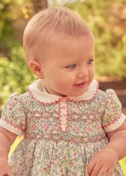Rompers | Rompers | Pepa London Cordelia Floral Hand-Smocked Short Sleeve Romper in Pink Made with Liberty Fabric (3m-2yrs)