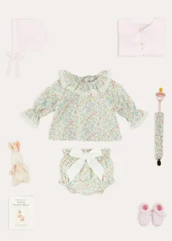 Lookbooks | Pepa London Cordelia Floral Long Sleeve Blouse in Pink Made with Liberty Fabric (1-12m) | Cordelia Floral Bloomer with Bow in Pink Made with Liberty Fabric (1m-2yrs) | Openwork Detail Baby Cardigan in Pink (1-12mths) | Lace Detail Knitted Bonnet in Pink (1-12mths) | Lace Detail Knitted Booties in Pink | Cordelia Liberty Floral Dummy Clip in Pink | BIBS Dummy in Pink