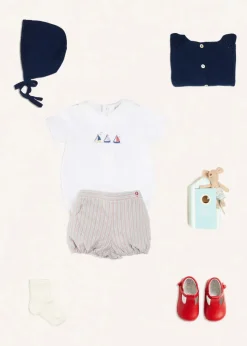 Lookbooks | Pepa London Embroidered Boat Motif Peter Pan Collar Bodysuit in White (1mth-3yrs) | Beaufort Striped Button Detail Bloomers in Red (3mths-3yrs) | Plain Cardigan in Navy (6mths-10yrs) | Openwork Knitted Bonnet in Navy (S-L) | T-Bar Pram Shoes in Red (17-20EU) | Ribbed Short Socks - Cream (0mths-10yrs)