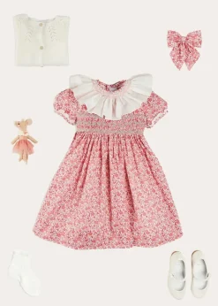 Lookbooks | Pepa London Emilia Floral Hand Smocked Ruffle Collar Short Sleeve Dress in Pink (12mths-10yrs) | Openwork Cotton Cardigan in Cream (6mths-10yrs) | Girls Ivory Leather Mary Jane Shoes (20-34EU) | Emilia Floral Long Bow Hair Clip in Pink | Openwork short socks White (0mths-8yrs)