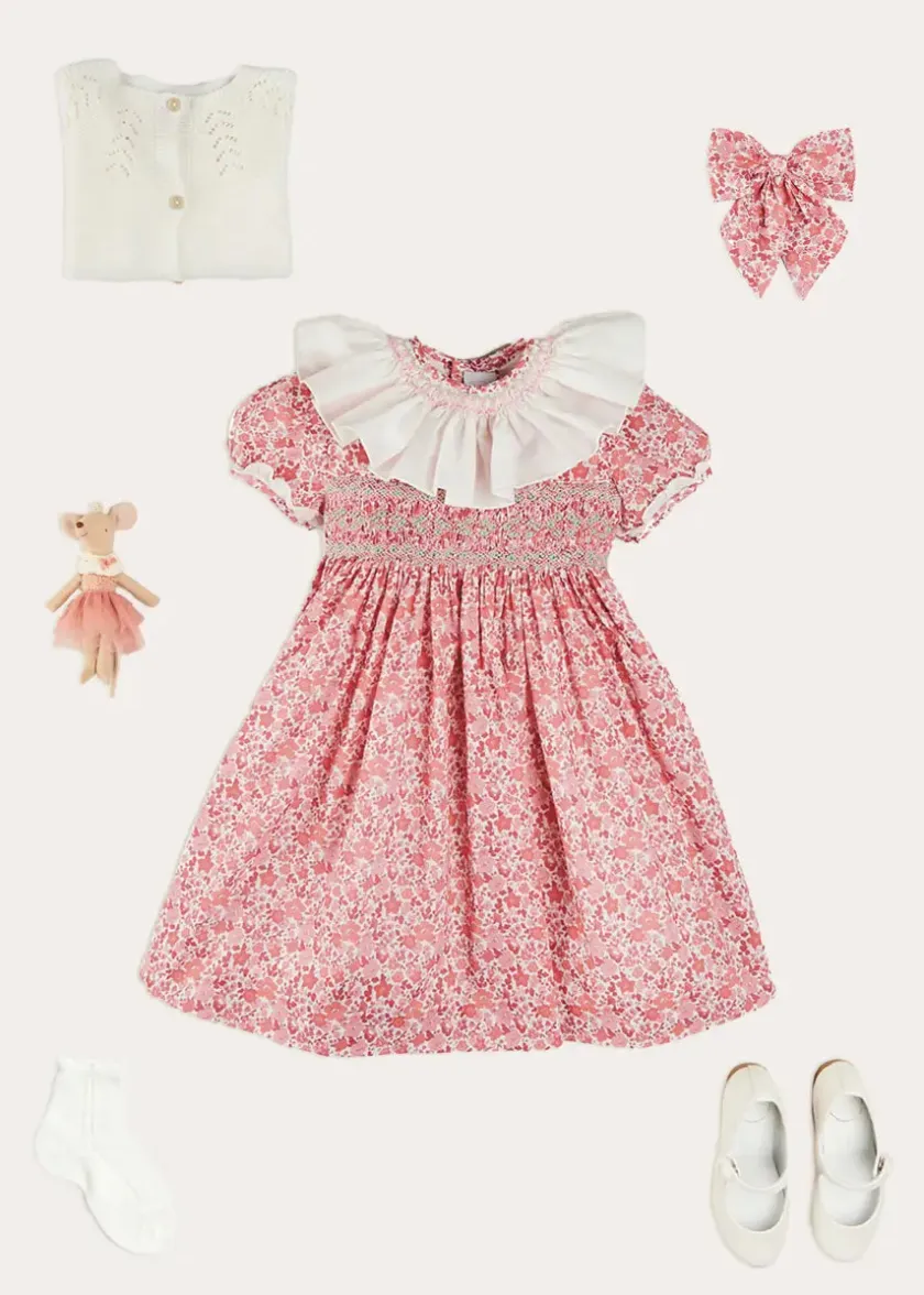 Lookbooks | Pepa London Emilia Floral Hand Smocked Ruffle Collar Short Sleeve Dress in Pink (12mths-10yrs) | Openwork Cotton Cardigan in Cream (6mths-10yrs) | Girls Ivory Leather Mary Jane Shoes (20-34EU) | Emilia Floral Long Bow Hair Clip in Pink | Openwork short socks White (0mths-8yrs)