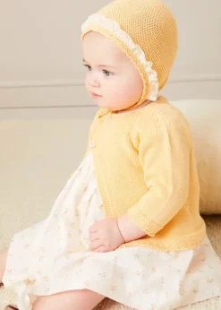 Lookbooks | Pepa London Esme Floral Hand Smocked Sleeveless Dress With Bloomers in White (1-12mths) | Openwork Detail Cotton Baby Cardigan in Tangerine (1-12mths) | Lace Detail Knitted Bonnet in Tangerine (1-12mths) | Celebration Ribbon Detail Mary Jane Pram Shoes in Beige (17-20EU) | Esme Floral Dummy Clip in White | Openwork short socks White (0mths-8yrs) | Chick Toy in Yellow