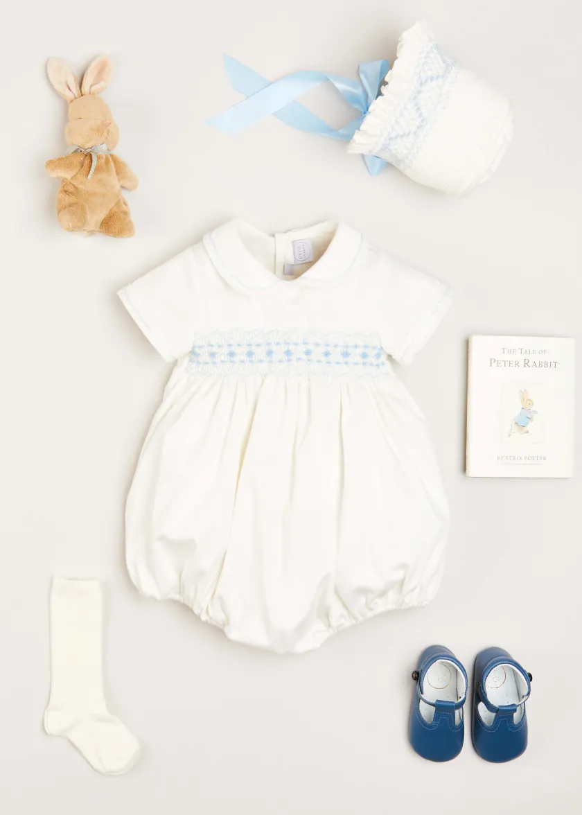 First Outfits | Gifting | Pepa London Gift boxes | Off White and Blue Hand Smocked Baby Bonnet | Plain high socks - Cream (0mths-10yrs) | Leather T-Bar Pram Shoes in Classic Blue (17-20EU) | My First Bunny in a Box - Blue