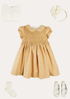Lookbooks | Pepa London Hand Smocked Peter Pan Collar Short Sleeve Dress in Beige (12mths-10yrs) | Openwork Cotton Cardigan in Cream (6mths-10yrs) | Girls Ivory Leather Mary Jane Shoes (20-34EU) | Traditional Big Bow Tulle Hairband in Ivory | Celebration Short Socks with Ruffle- Cream (0mths-10yrs) | Tulle Long Bow Clip In Cream