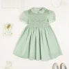 Lookbooks | Pepa London Hand Smocked Peter Pan Collar Short Sleeve Dress in Green (12mths-10yrs) | Openwork Cotton Cardigan in Cream (6mths-10yrs) | Girls Ivory Leather Mary Jane Shoes (20-34EU) | Traditional Big Bow Tulle Hairband in Ivory | Flower Fairies of the Spring Book in White | Openwork short socks White (0mths-8yrs)