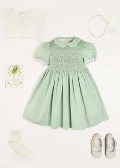 Lookbooks | Pepa London Hand Smocked Peter Pan Collar Short Sleeve Dress in Green (12mths-10yrs) | Openwork Cotton Cardigan in Cream (6mths-10yrs) | Girls Ivory Leather Mary Jane Shoes (20-34EU) | Traditional Big Bow Tulle Hairband in Ivory | Flower Fairies of the Spring Book in White | Openwork short socks White (0mths-8yrs)