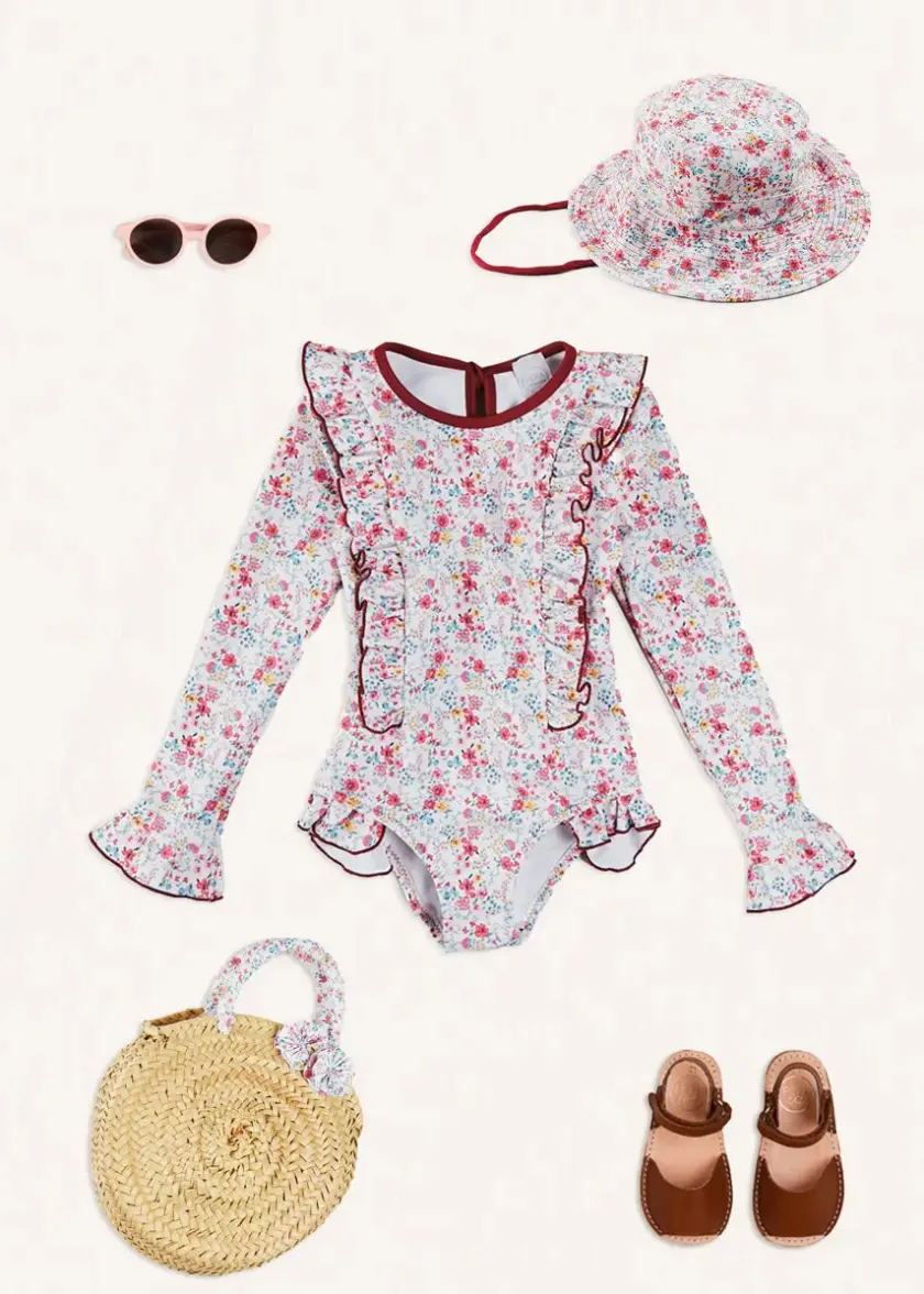 Lookbooks | Pepa London Louisa Floral Ruffle Trim Long Sleeve Swimsuit in Pink (2-10yrs) | Louisa Floral Beach Hat in Pink (S-M) | Open Toe Leather Sandals in Brown (17-30EU) | Louisa Floral Detail Raffia Bag in Coral