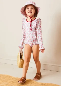 Swimwear | Swimwear | Pepa London Louisa Floral Ruffle Trim Long Sleeve Swimsuit in Pink (2-10yrs)