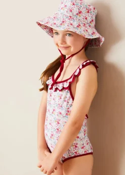 Lookbooks | Pepa London Louisa Floral Ruffle Trim Swimsuit in Pink (2-10yrs) | Louisa Floral Beach Hat in Pink (S-M) | Louisa Floral Detail Raffia Bag in Coral | Leather Buckle Detail Sandals in Camel (24-34EU)