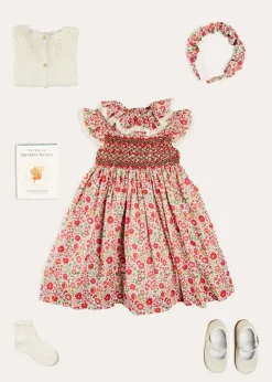 Lookbooks | Pepa London Margot Hand-Smocked Dress in Red Made with Liberty Fabric (12m-6yrs) | Openwork Cotton Cardigan in Cream (6mths-10yrs) | Mary Jane Leather Baby Shoes in Ivory (20-24EU) | Margot Liberty Floral Scrunchie Hairband in Red | Openwork short socks White (0mths-8yrs)