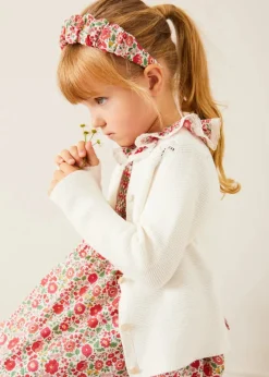 Lookbooks | Pepa London Margot Hand-Smocked Dress in Red Made with Liberty Fabric (12m-6yrs) | Openwork Cotton Cardigan in Cream (6mths-10yrs) | Mary Jane Leather Baby Shoes in Ivory (20-24EU) | Margot Liberty Floral Scrunchie Hairband in Red | Openwork short socks White (0mths-8yrs)