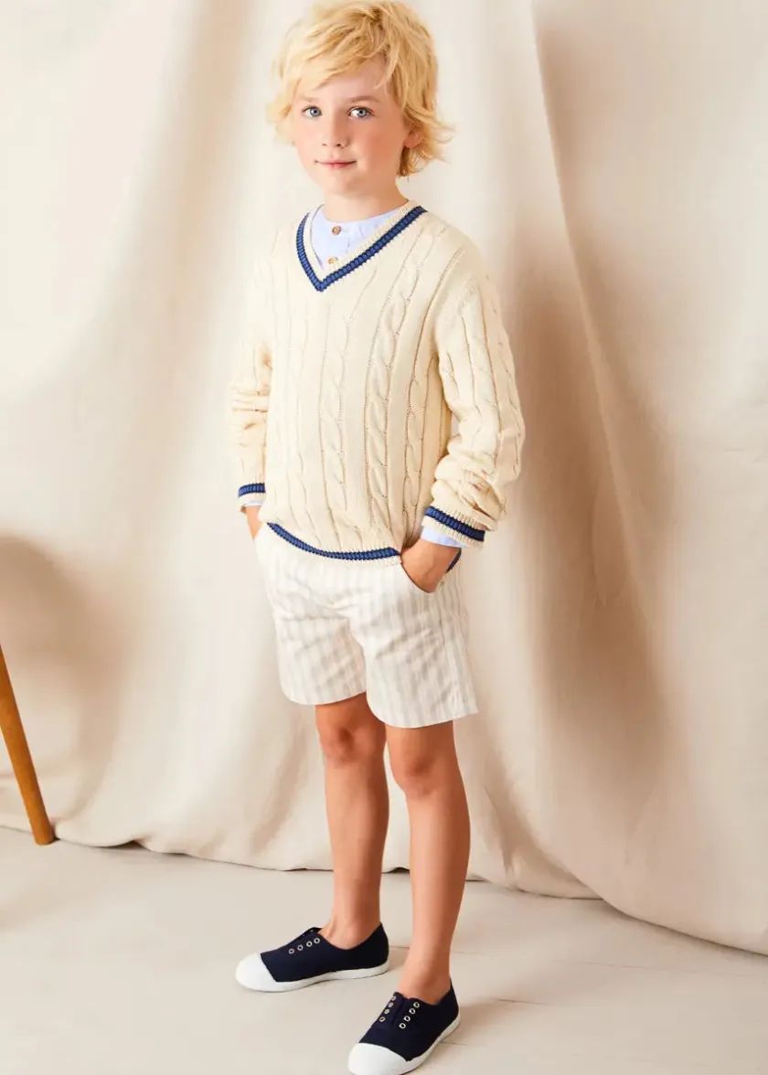 Lookbooks | Pepa London Plain Mao Collar Long Sleeve Shirt in Blue (4-10yrs) | Brompton Striped Shorts in Beige (4-10yrs) | Cable Knit V-Neck Jumper in Cream (4-10yrs) | Canvas Plimsolls in Navy (20-35EU) | Cream Boy's Belt