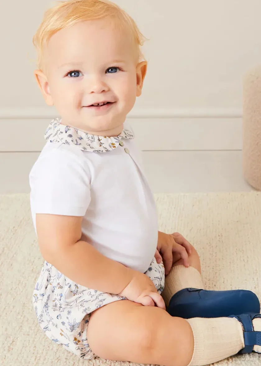 Lookbooks | Pepa London Whale Intarsia Striped Jumper in Blue (6mths-10yrs) | Ellis Short Sleeve Bodysuit with Printed Collar Made with Liberty Fabric (1m-2yrs) | Ellis Floral Bloomer in Blue Made with Liberty Fabric (1m-3yrs) | Leather T-Bar Pram Shoes in Classic Blue (17-20EU) | Ribbed Short Socks in Beige (0mths-10yrs) | Big Brother Beach Mouse Toy | Ellis Dummy Clip in Blue Made with Liberty Fabric